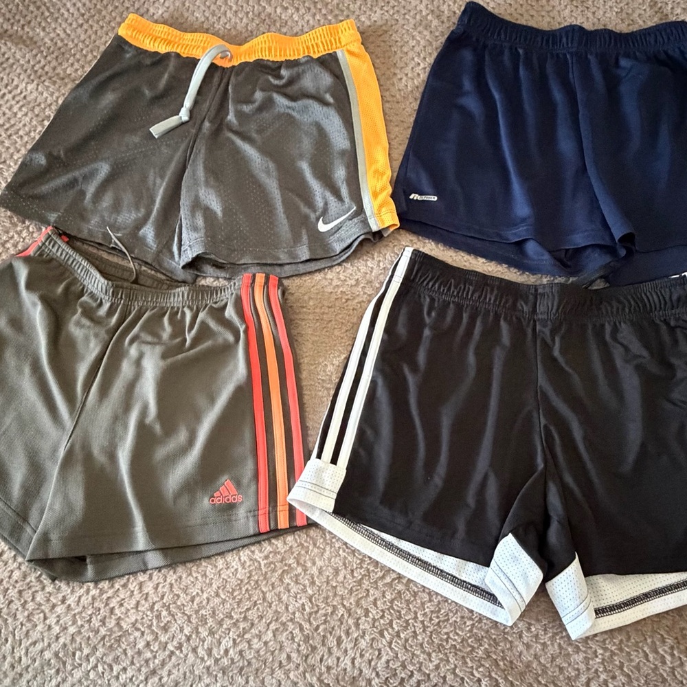 BUNDLE of 4 pair athletic shorts (Nike, Adidas (2), and Russell